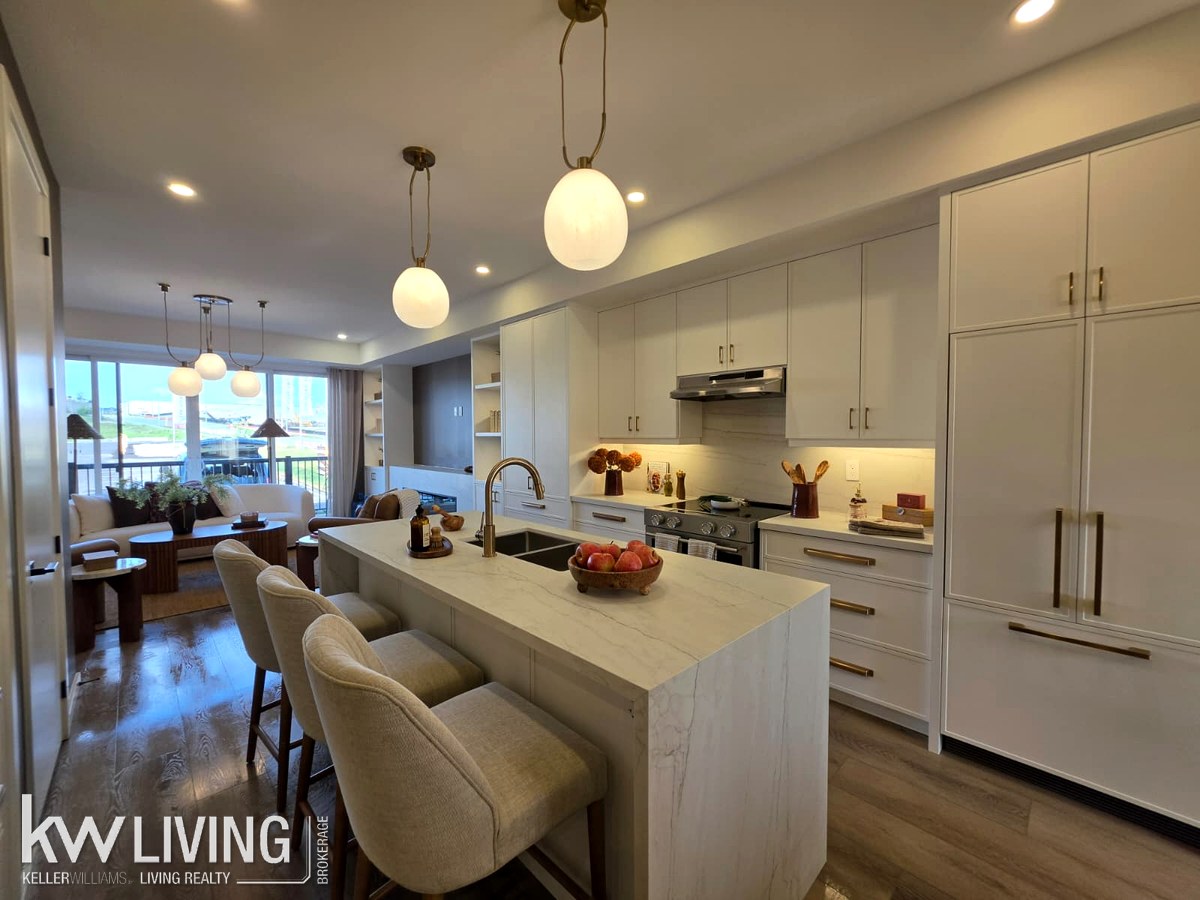 AVELLA model suite kitchen and living area
